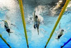 Katie Ledecky wins 800m freestyle gold at World Aquatics Championships, defeating rival Summer McIntosh